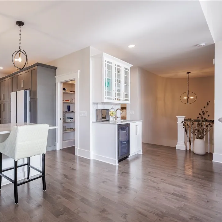 Wet bar and custom pantry off the open dining area